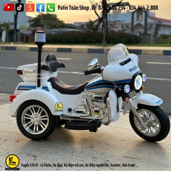1 2 600x600 - Xe Moto điện trẻ em Cảnh sát SMT 111 Màu trắng